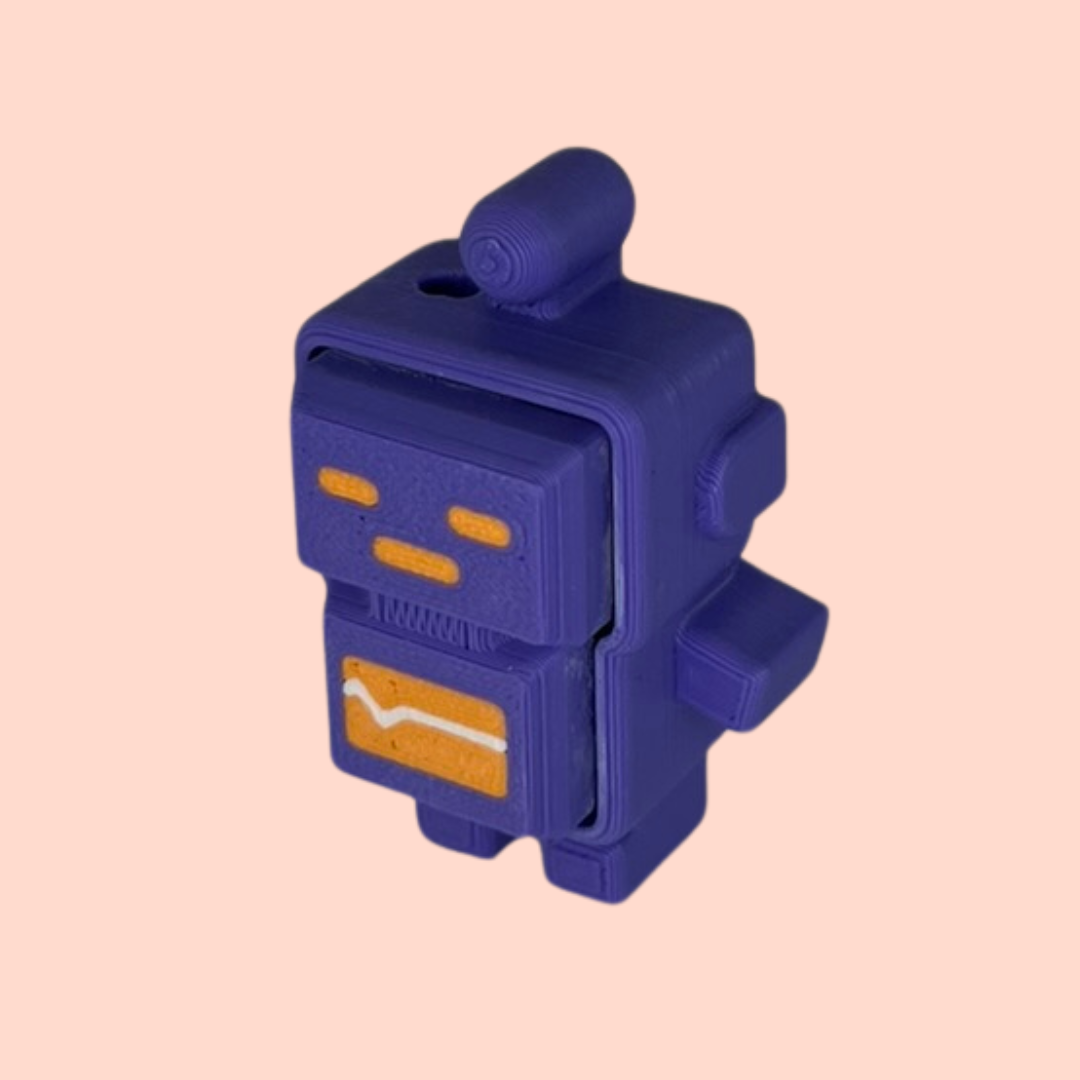 Blue robot-shaped object on a beige background