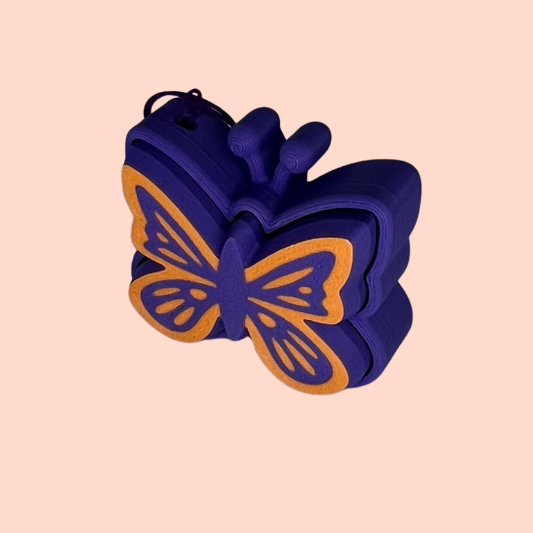 Blue butterfly-shaped object on a beige background