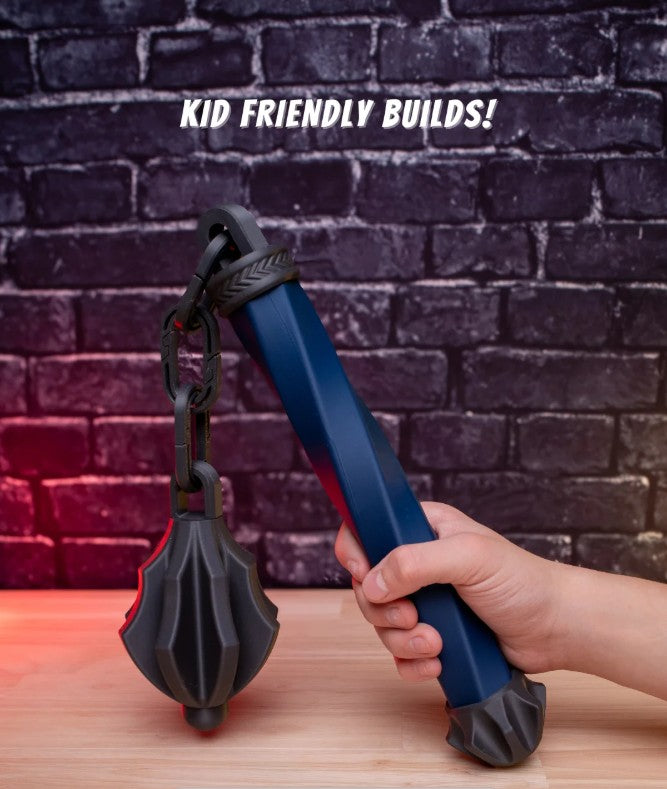 Blue and black tool held by a hand with 'KID FRIENDLY BUILDS!' text above on a brick wall background.