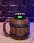 Garnet-colored mug shaped like a barrel with 'RUM' text, containing a can on a wooden surface.